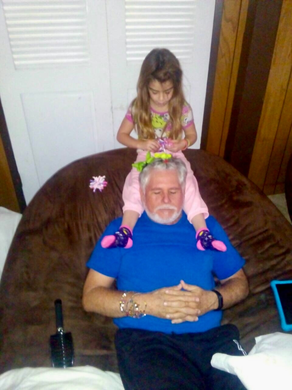 Grandfather relaxing with grandchild